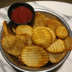 Gluten free fries and ketchup from Mama Shelter