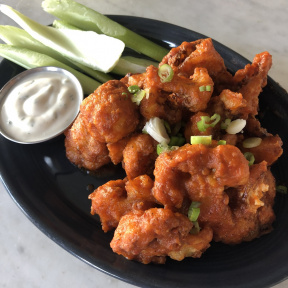 Gluten-free vegan buffalo cauliflower from Cafe Gratitude