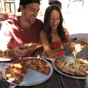 Jackie and Brendan eating pizza at Colony Grill