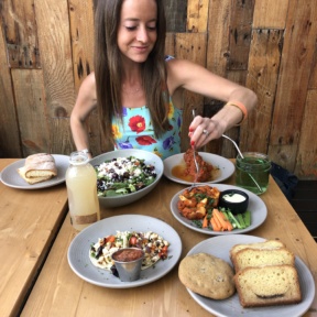 Jackie eating buffalo cauliflower at Kreation