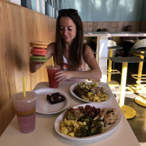 Jackie ready to eat macarons at Lemonade