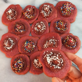 Jackie holding a Beet Sugar Cookie