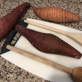 Cutting into Hasselback Sweet Potatoes