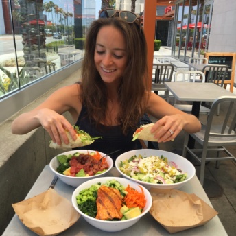 Jackie eating gluten-free tacos at a restaurant