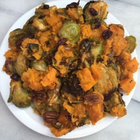 Roasted Brussels Sprouts and Squash with Almond Butter, Pecans, & Cranberries