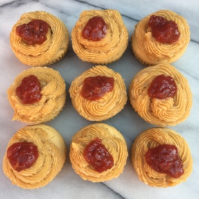 Almond Butter Cupcakes with Barney Butter frosting topped with jam