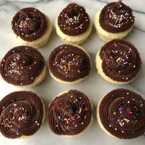 Yellow Cupcakes with Chocolate Buttercream Frosting