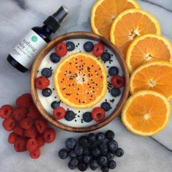 Gluten-free vegan yogurt bowl with Ora Organic omega-3 spray