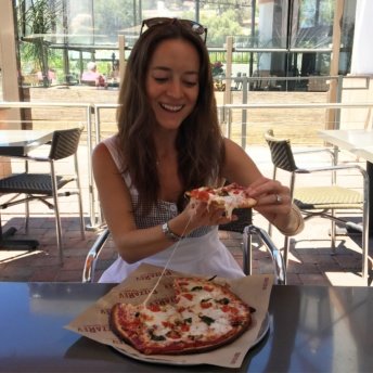Jackie with Gluten-free pizza from PizzaRev