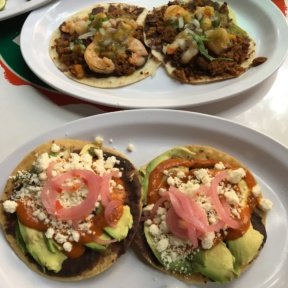 Gluten-free shrimp and bean tacos from Tacombi