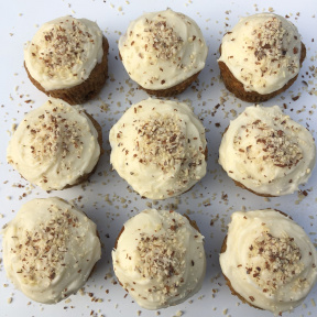 Carrot Cupcakes with cream cheese frosting and chopped nuts