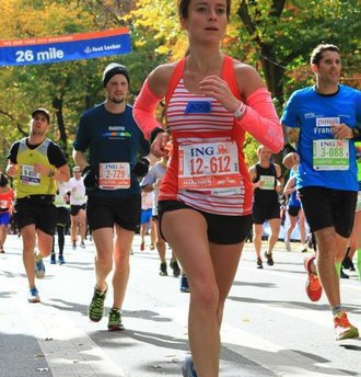 Jackie running the NYC Marathon in 2013