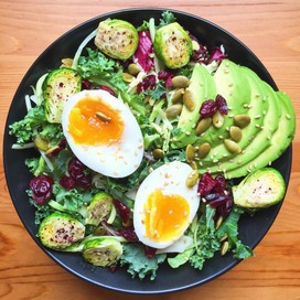 Salad with soft-boiled eggs and avocado