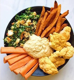Hummus bowl with veggies and dippers