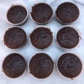 Gluten-free chocolate cupcakes ready to frost