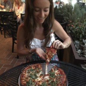 Jackie with her gluten-free pizza at Petrini's