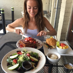 Jackie cutting the stuffed French toast at Kozy Kitchen