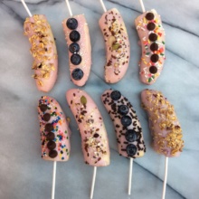 Frozen Yogurt Dipped Bananas with toppings
