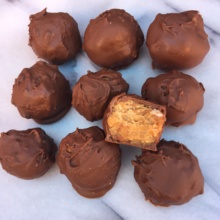 Peanut Butter Cream Cheese Balls covered in chocolate