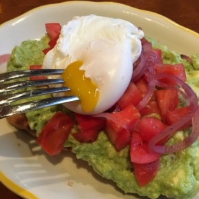 Avocado bruschetta with a poached egg from Nizza
