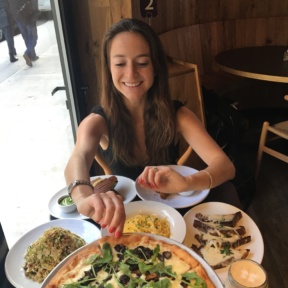 Jackie eating pizza at Tali