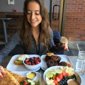 Jackie about to dive into avocado grilled cheese at Granola Bar