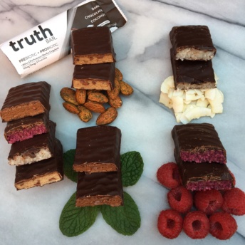 Four types of gluten-free bars by Truth Bar