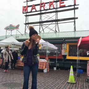 Jackie eating at Cinnamon Works in Pike Place Market