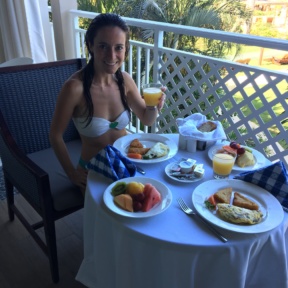 Jackie enjoying room service for breakfast at Sandals