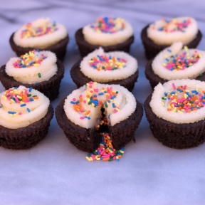 Sprinkle Filled Brownie Cupcakes cut open