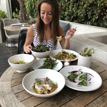 Jackie eating at Plant Food + Wine