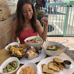 Jackie eating plantains and guac at Tocaya