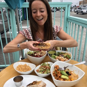 Jackie eating the guiltless burrito at Tocaya