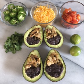 Making Taco Stuffed Avocados with Tiny Little Chef seasoning blends