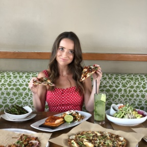 Jackie eating pizza at California Pizza Kitchen