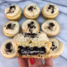 The inside of Cookie Stuffed Vanilla Cupcakes