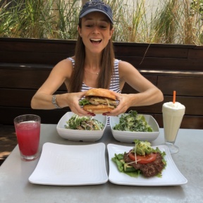 Jackie going for the burger at Burger Lounge