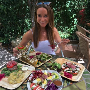 Jackie eating at 100% gluten-free eatery Food Harmonics