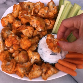 Dipping the Cauliflower Buffalo Bites