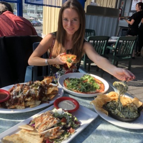 Jackie eating pizza at Tony P's Dockside Grill in MDR