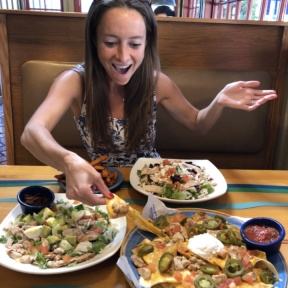 Jackie in awe of the nachos at Islands Restaurants