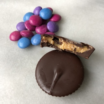 Gluten-free chocolate gems and peanut butter cups by UnReal