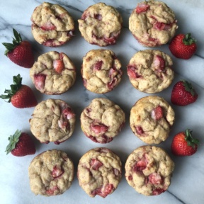 Strawberry Banana Protein Muffins with fresh strawberries