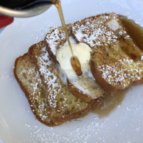 Gluten-free French toast and syrup from Luci's at the Orchard