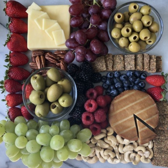 Gluten-free Cheese Platter with olives, fruit, and nuts