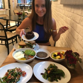 Jackie eating cake at Nourish