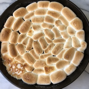 S'mores Skillet Dip with golden brown marshmallows