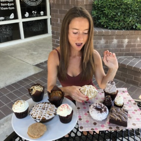 Jackie ready to eat a donut at Karma Baker