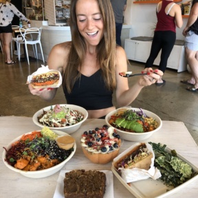 Jackie eating at Vibe Organic Kitchen in Newport Beach