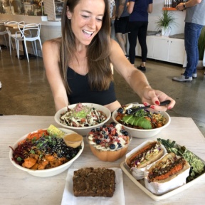 Jackie eating a 100% GF meal at Vibe Organic Kitchen